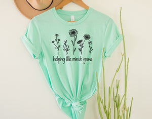 Helping Little Minds Grow graphic tee
